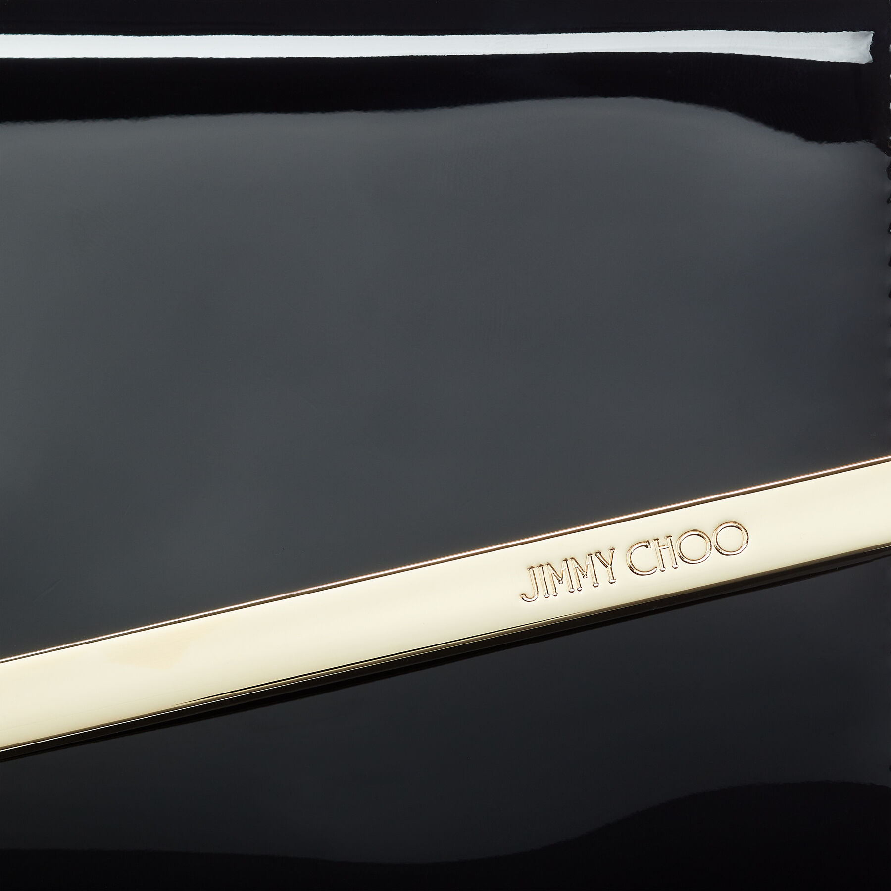 Emmie Black Patent Leather Clutch Bag