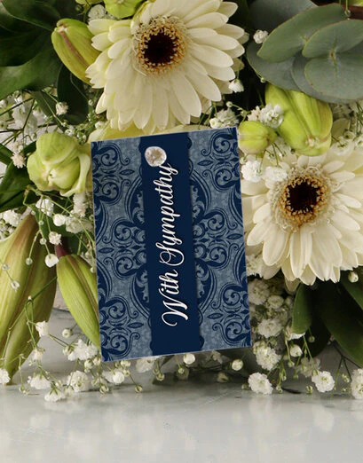 With Sympathy Lilies and Roses Arrangement