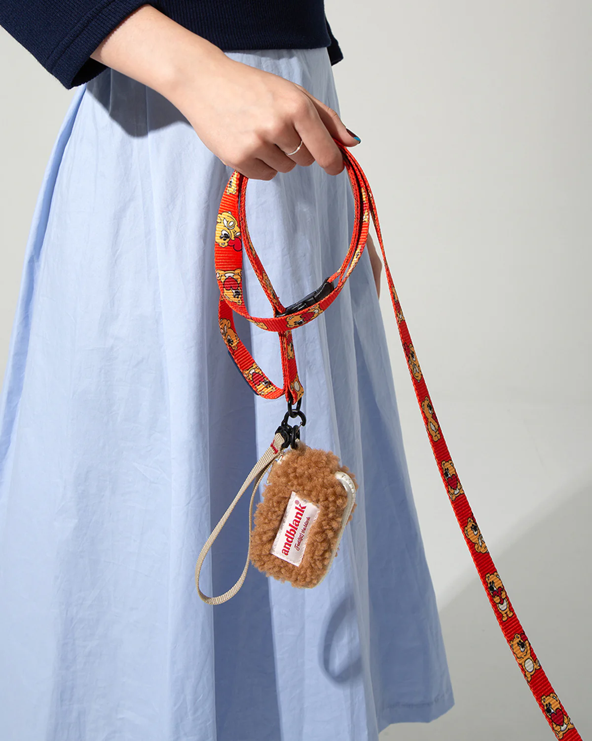 Fleece poop bag case . Camel