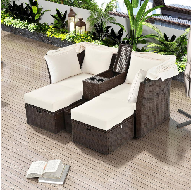 Rattan outdoor patio sofa bed with cushions, folding awning, cup holder and storage box