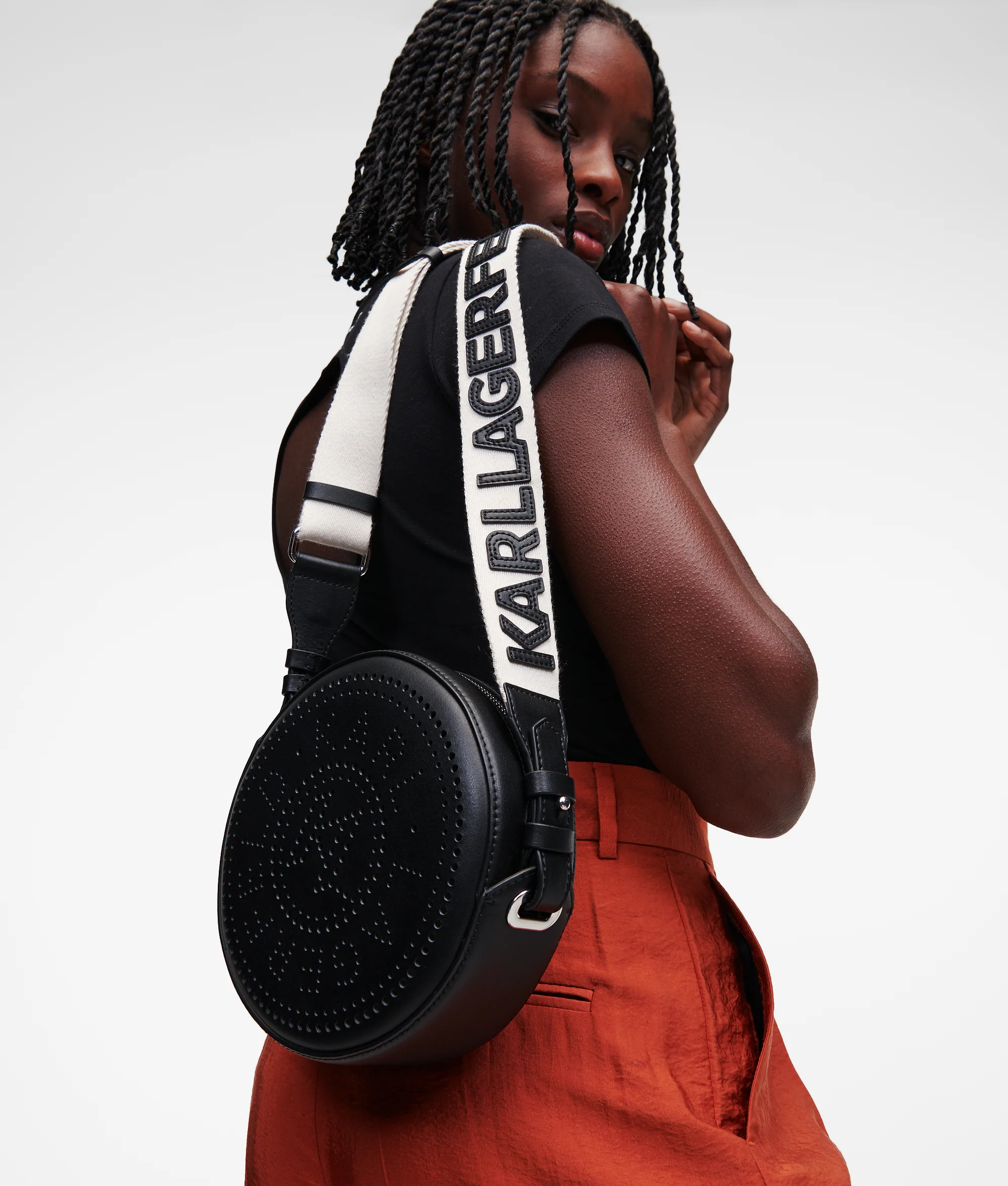 K/CIRCLE EMBOSSED LOGO ROUND CROSSBODY BAG