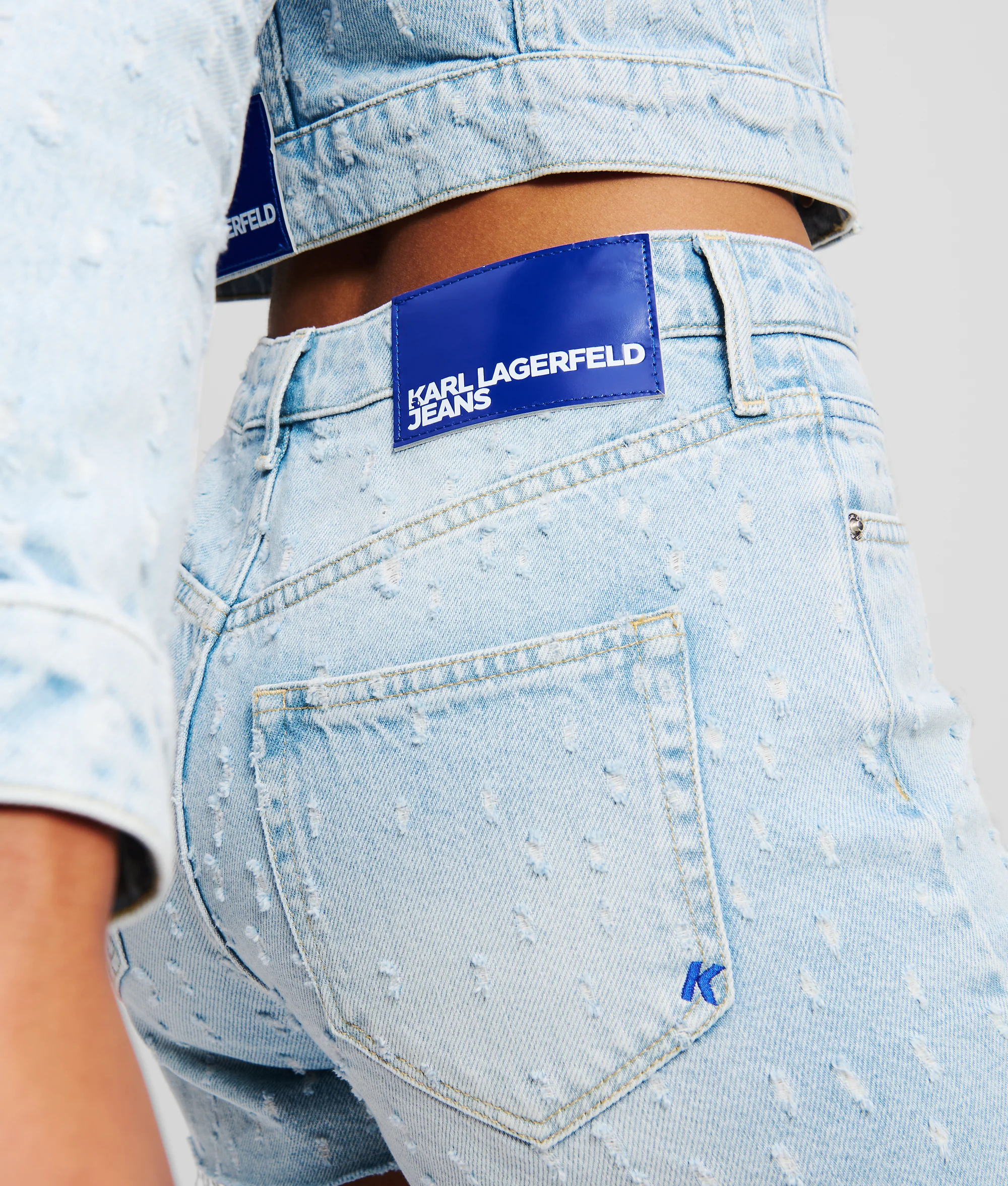 MID-RISE BOUCLÉ DENIM SHORTS