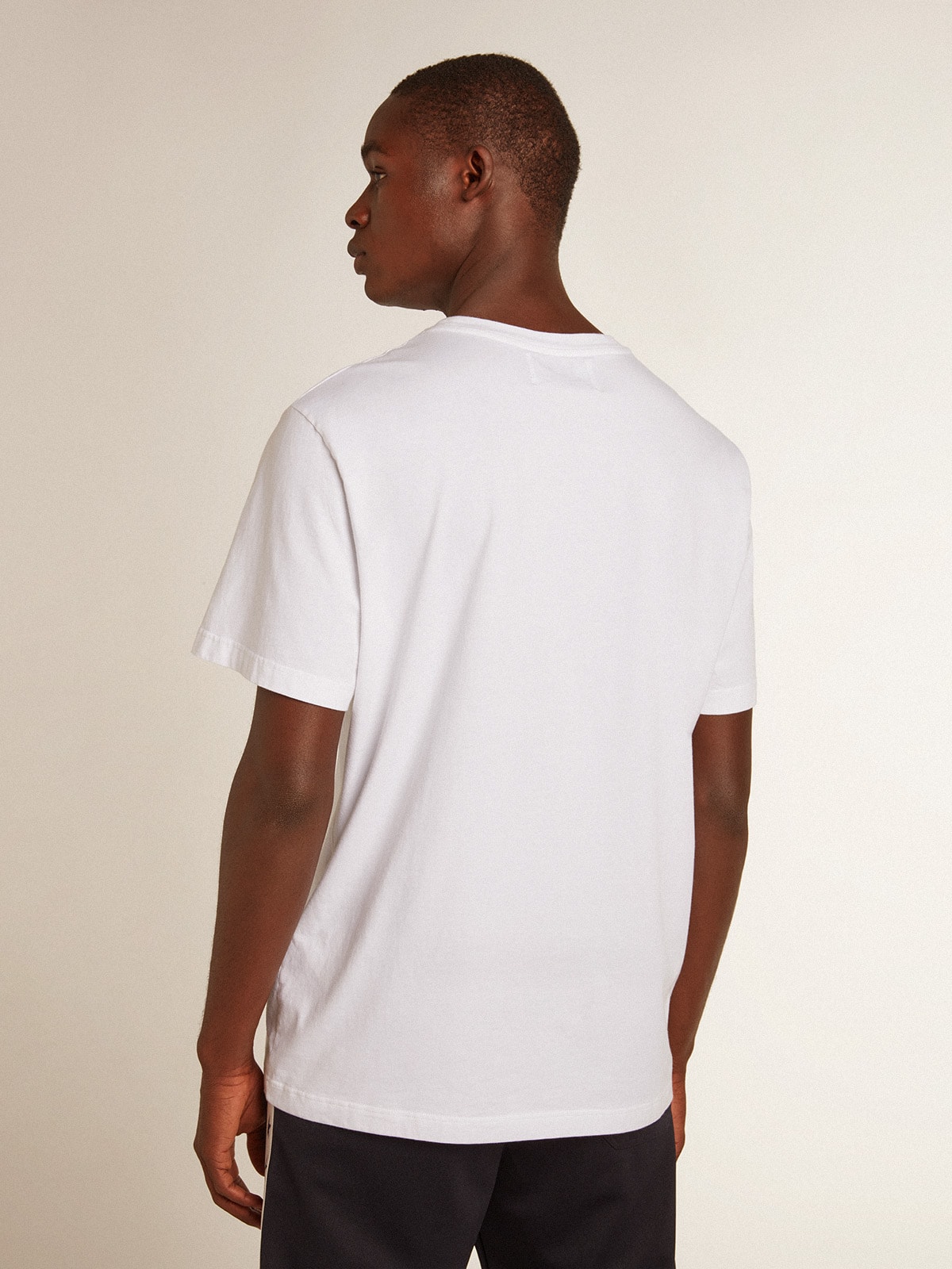 Men’s white T-shirt with dark blue star on the front