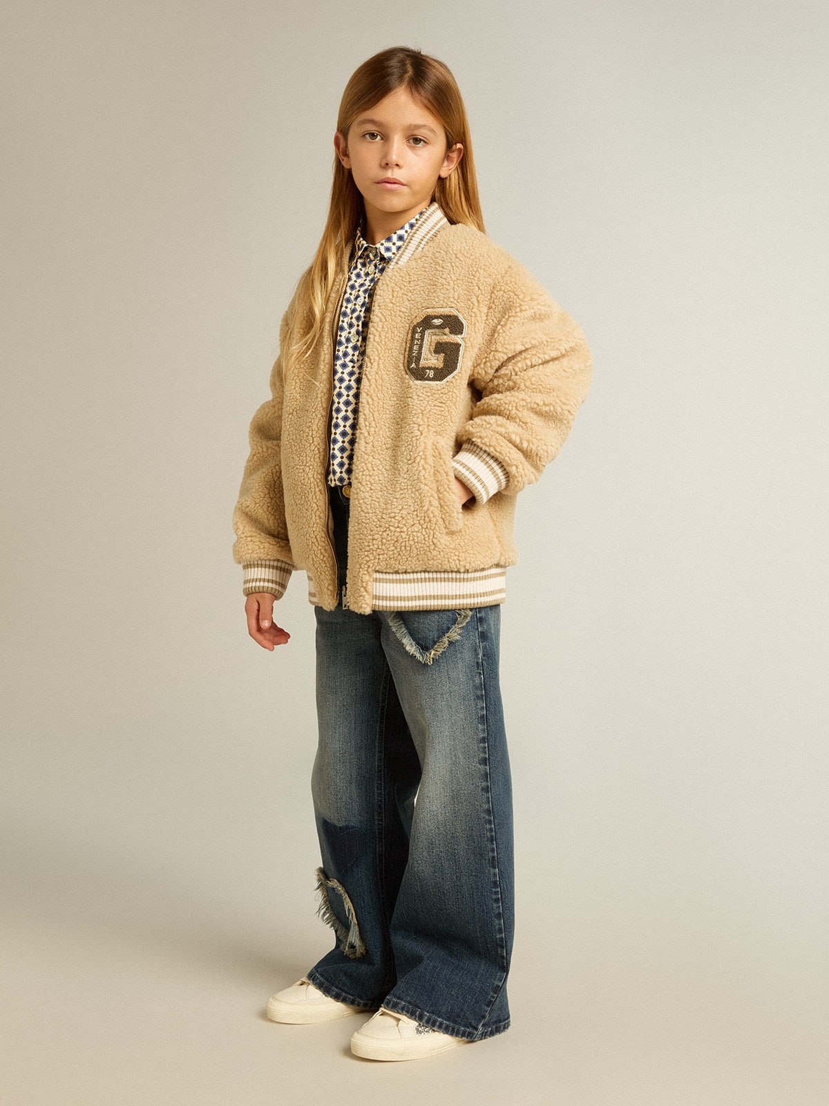 Girls' polo shirt with geometric print