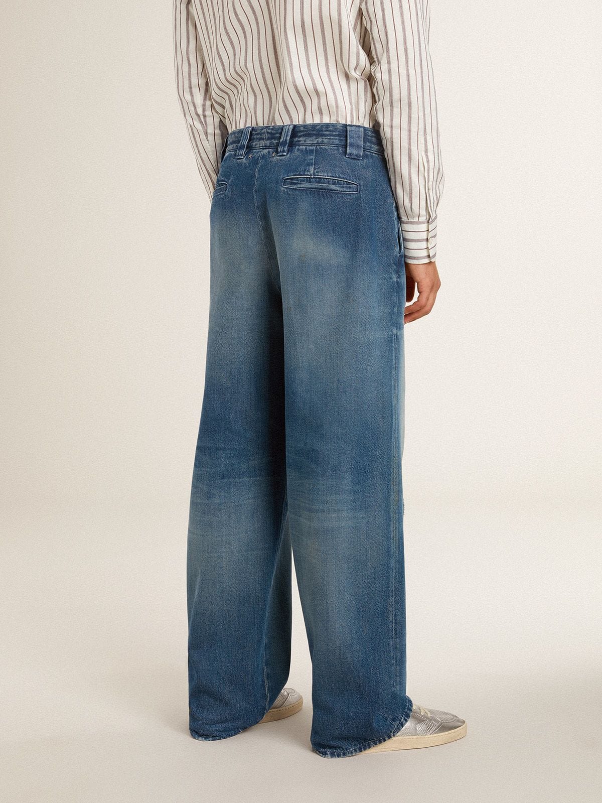 Men's denim chinos with distressed details