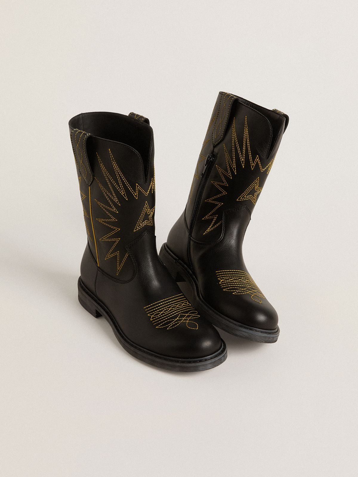 Wish Junior boots in black leather with yellow star embroidery