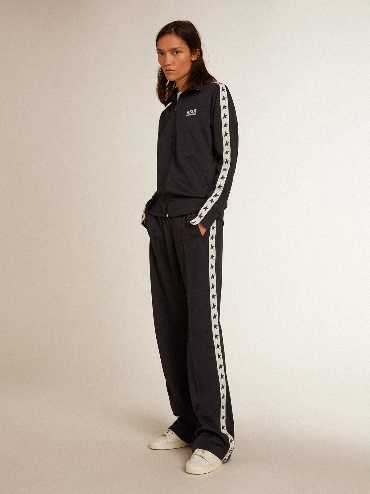 Women’s white T-shirt with dark blue star on the front