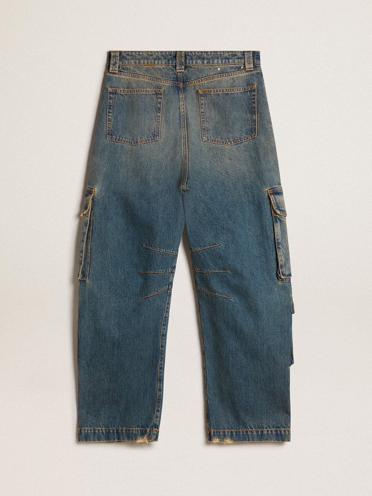 Blue jeans with a distressed finish
