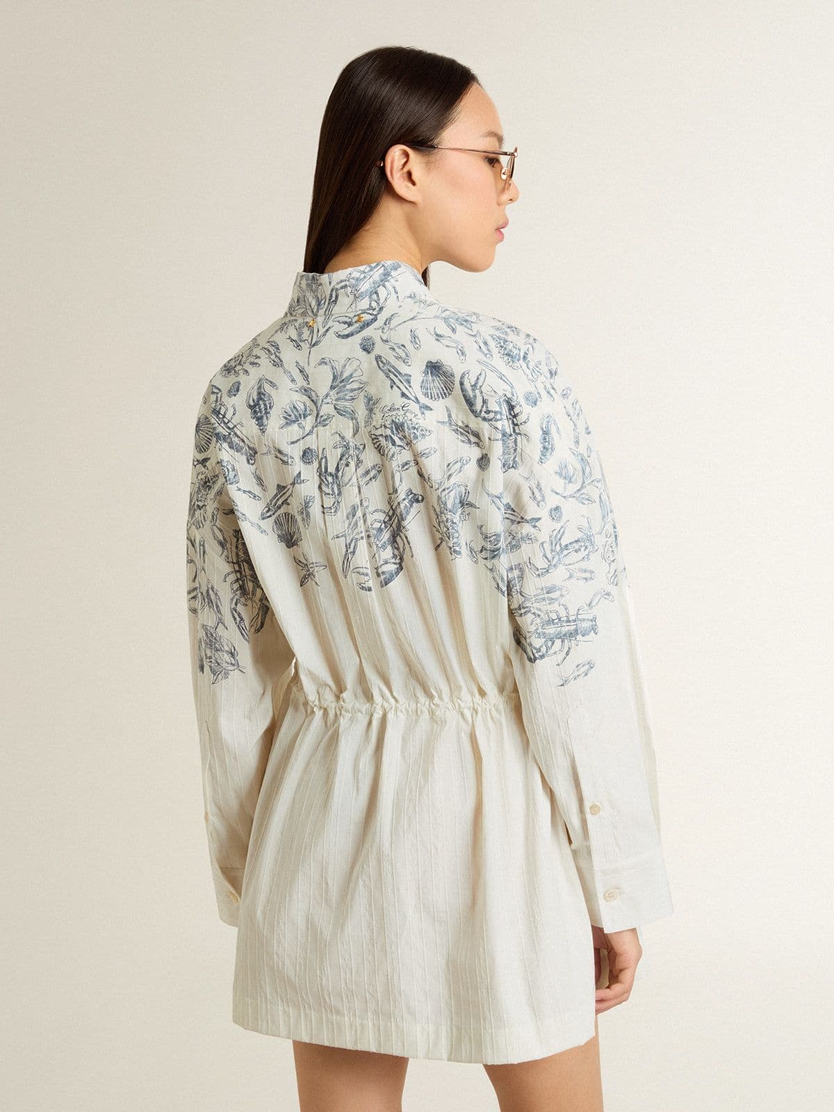 Women's short shirt dress in white striped cotton with a blue marine print