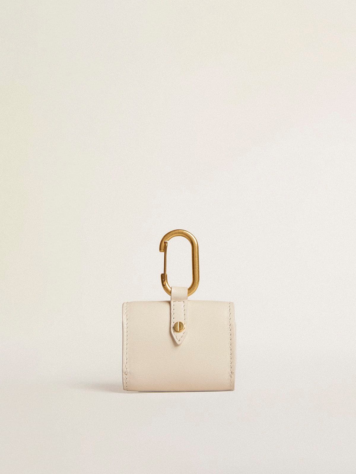 Worn white AirPod case