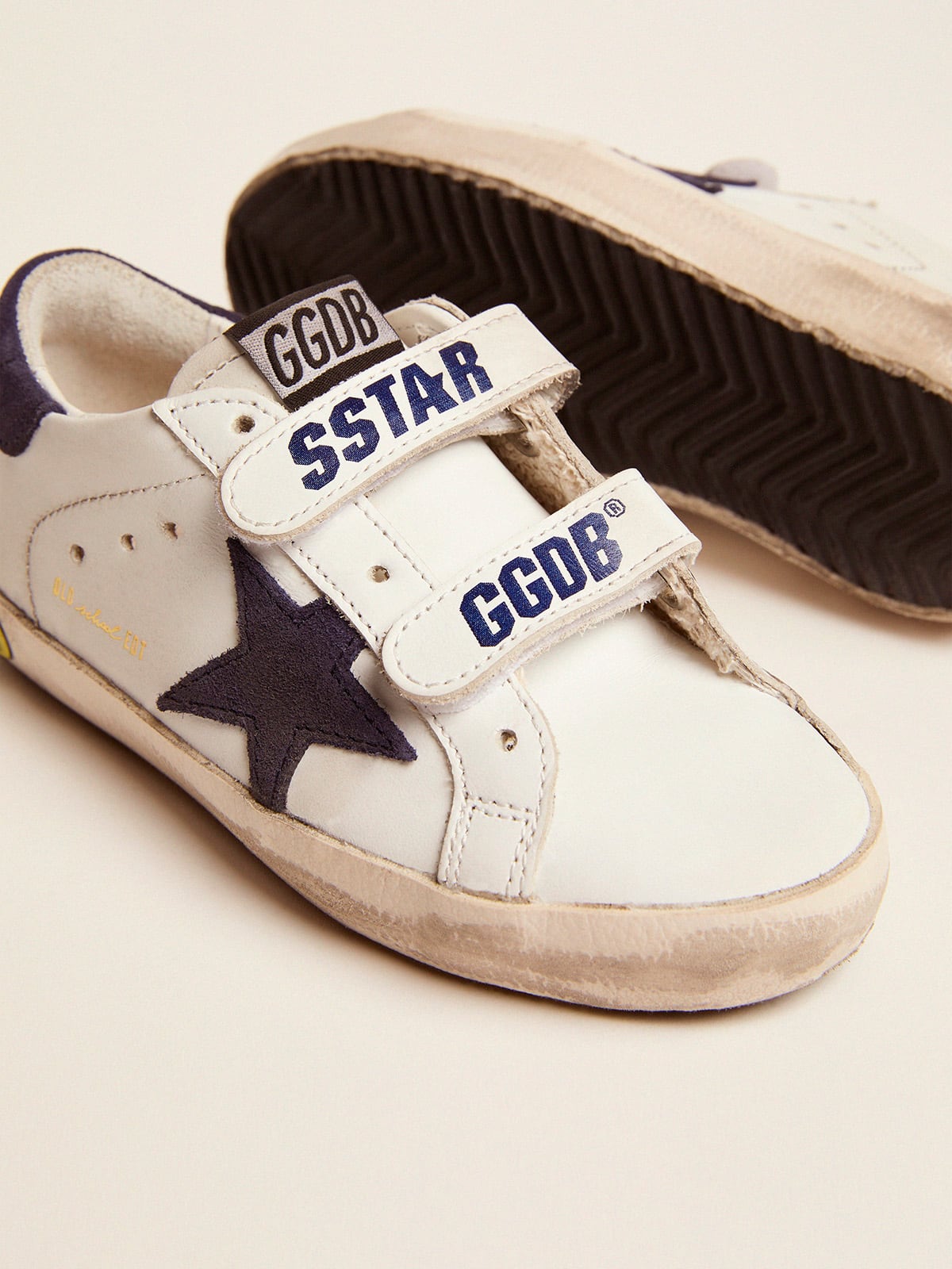 Young Old School in white leather with blue suede star and heel tab