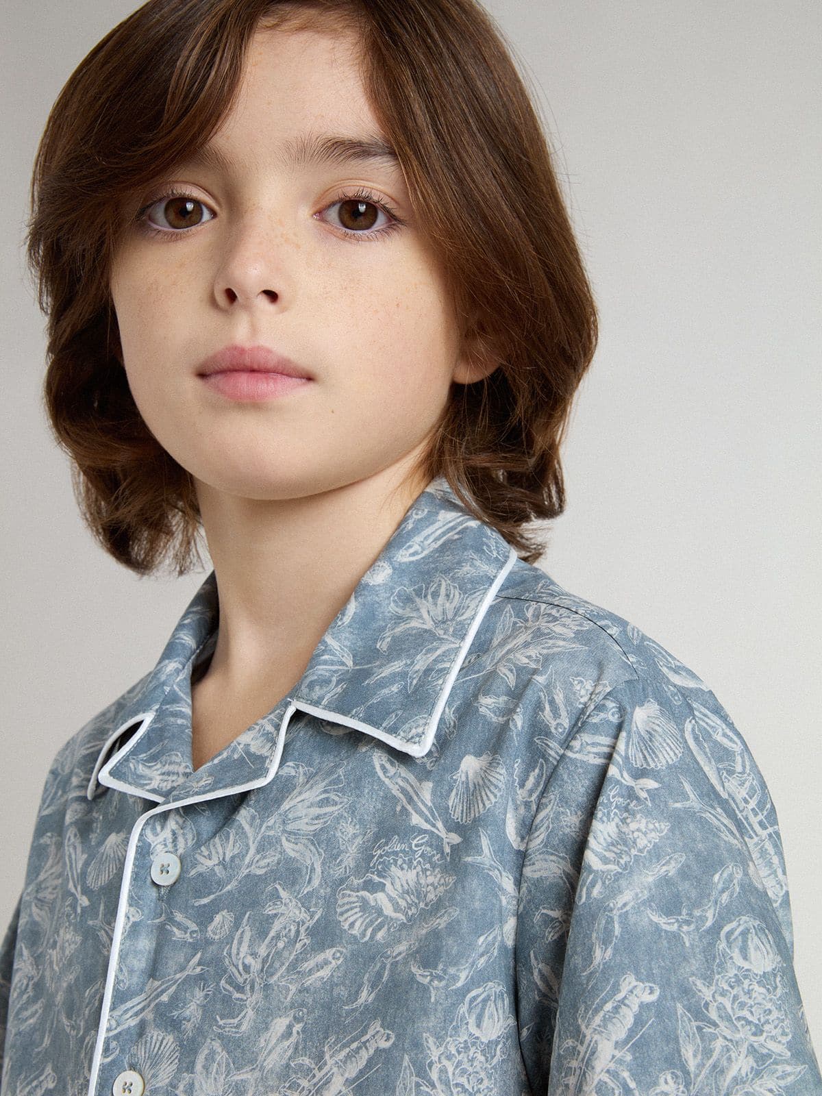 Boys' blue shirt with white print