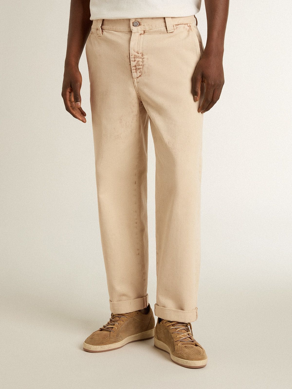 Men's beige chinos with a lived-in look finish