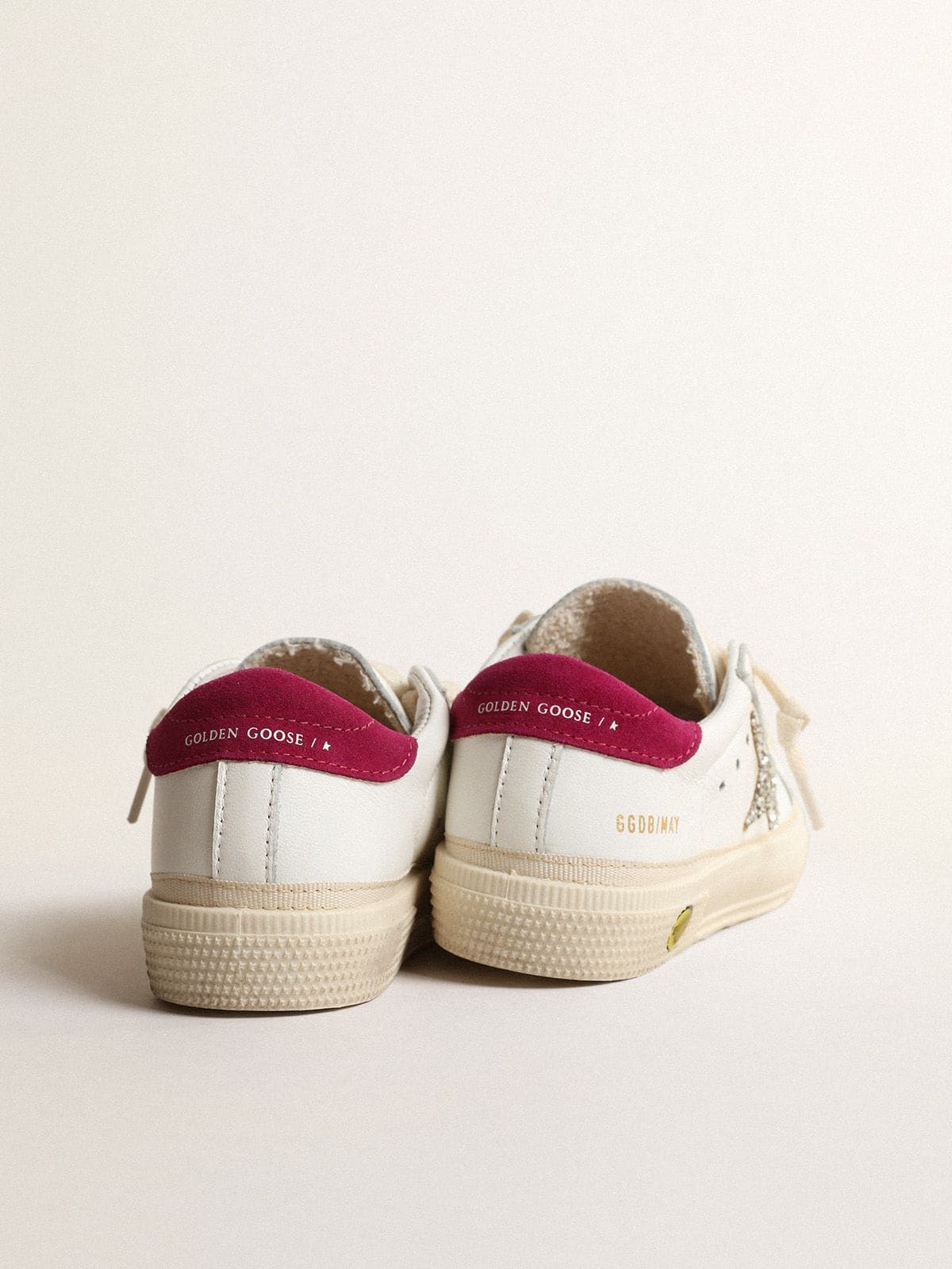 May Young in nappa leather with platinum glitter star and magenta heel tab