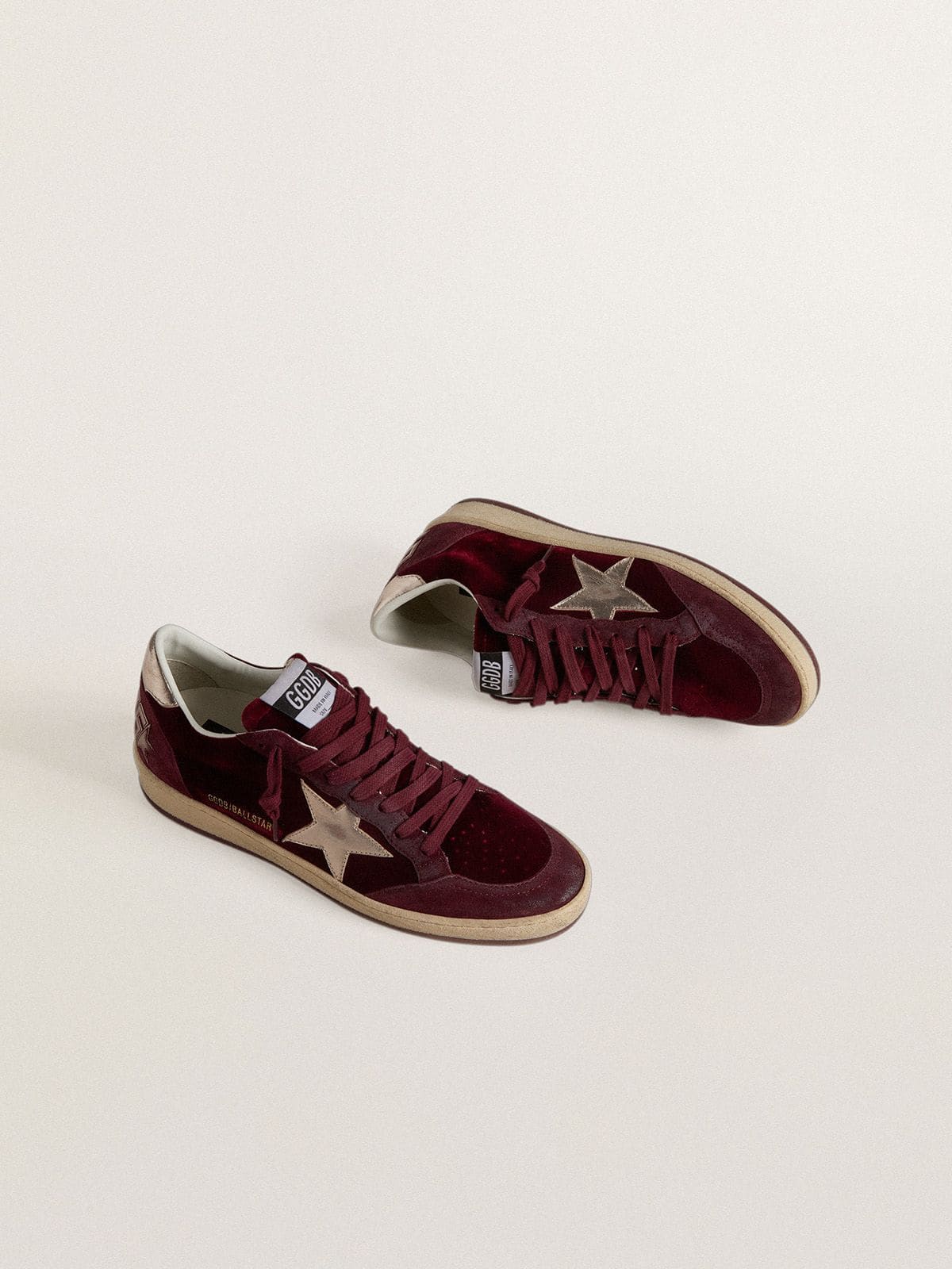 Women's Ball Star in burgundy velvet with gold metallic leather star and heel tab