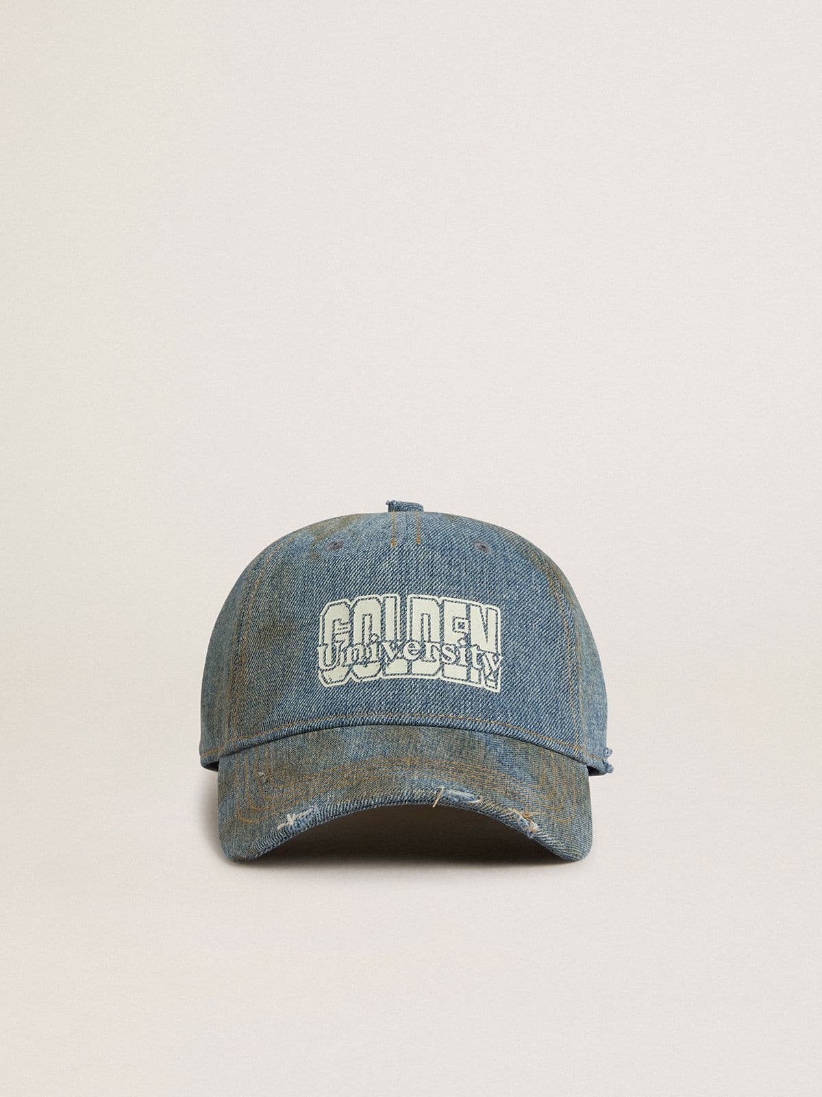 Denim-colored cotton baseball cap with a lived-in finish