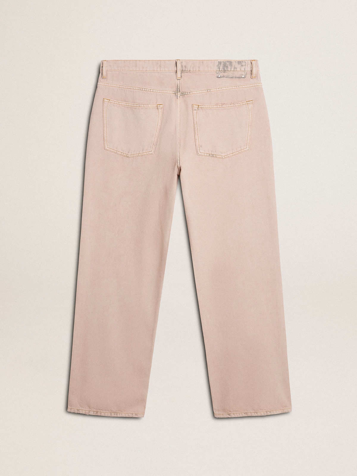 Men's pink dyed jeans