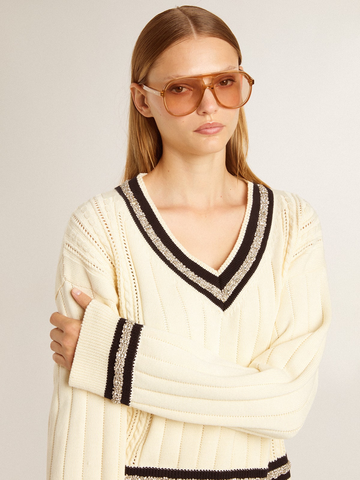 Women's cable-pattern cropped sweater with blue ribbing and crystals