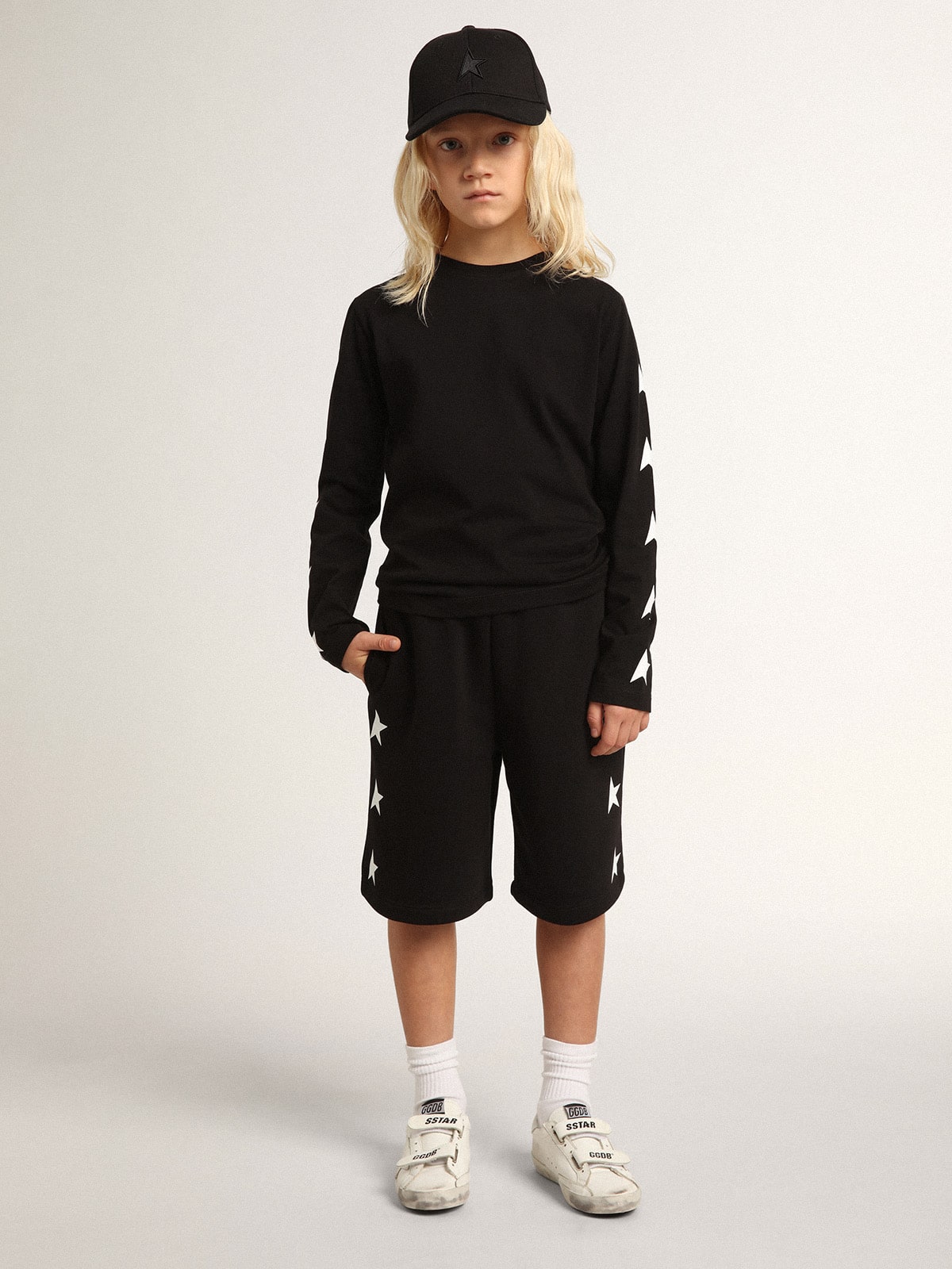 Boys’ black Bermuda shorts with white stars