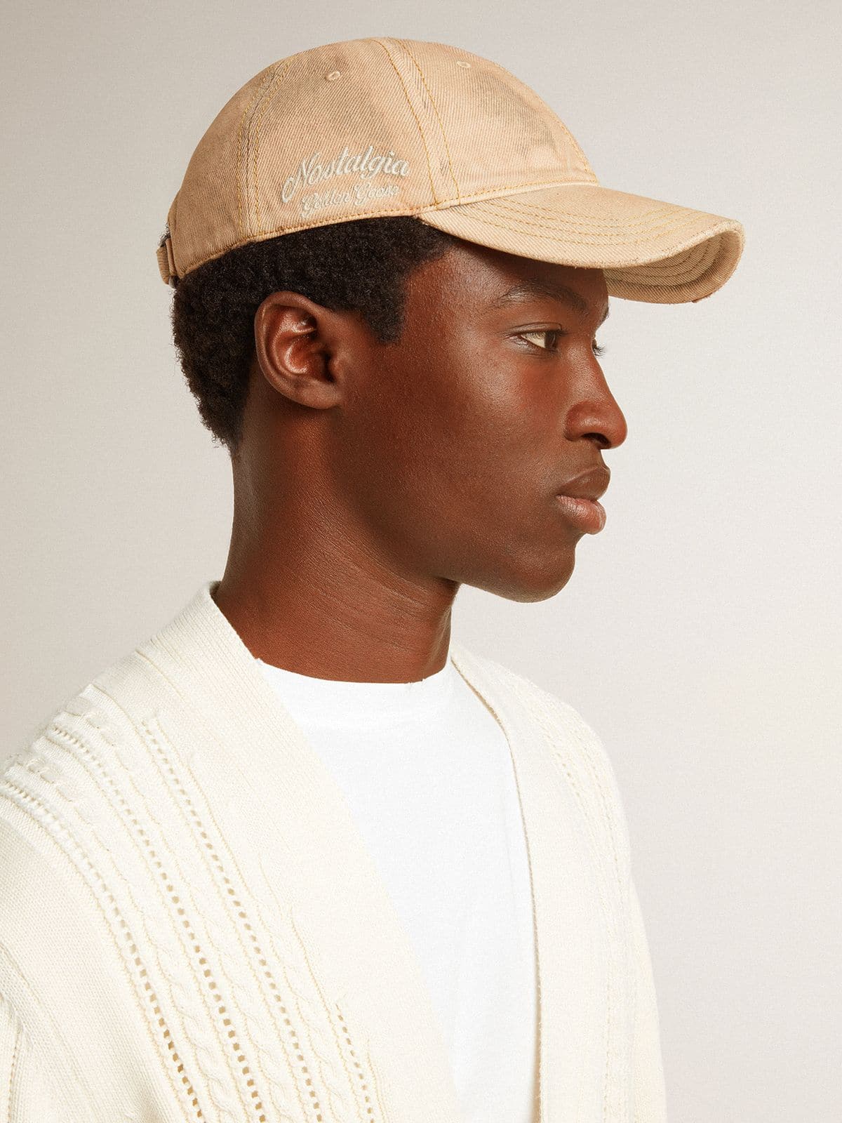 Beige baseball cap with a lived-in finish