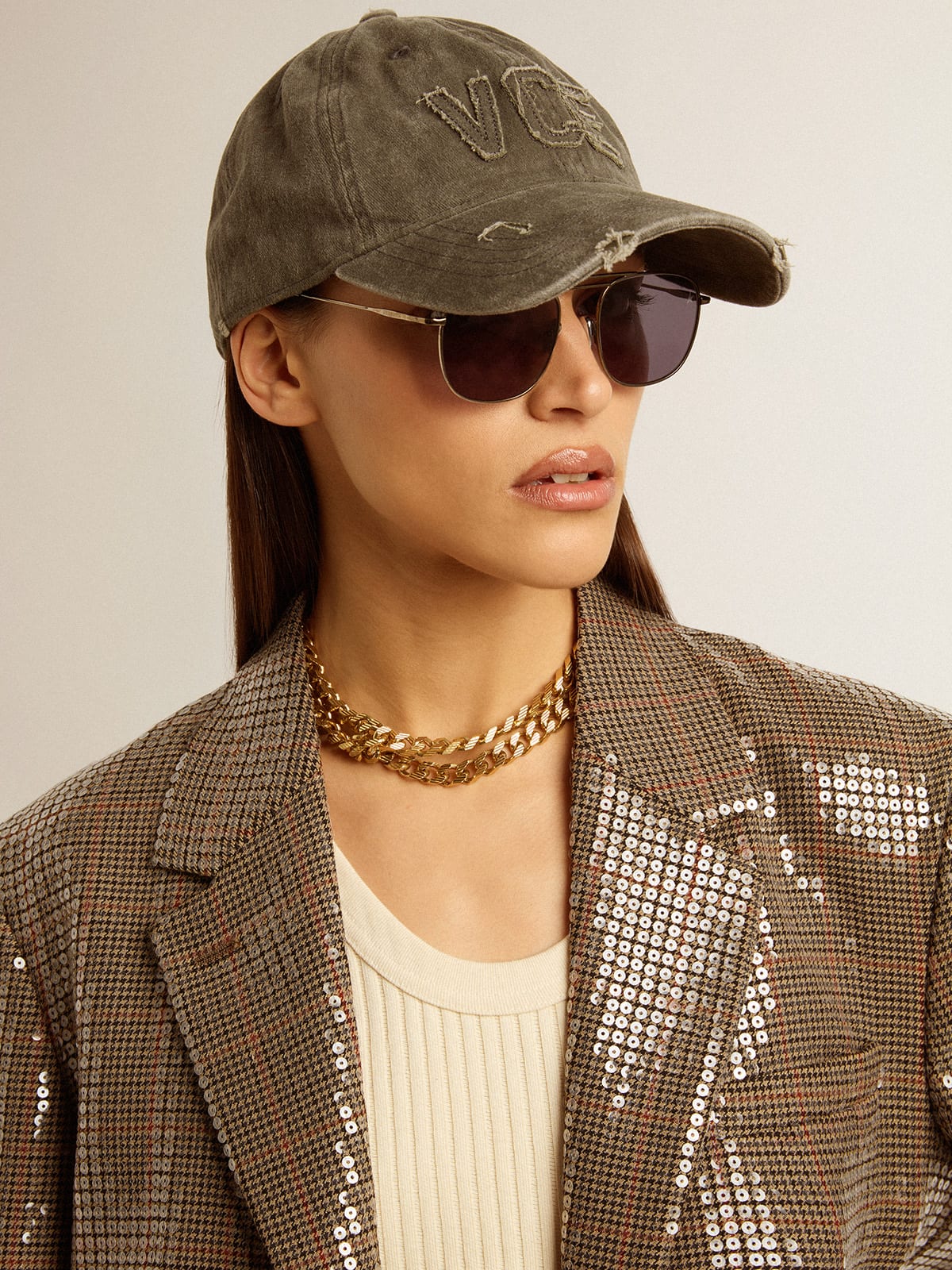 Olive-green cotton baseball cap with a lived-in finish