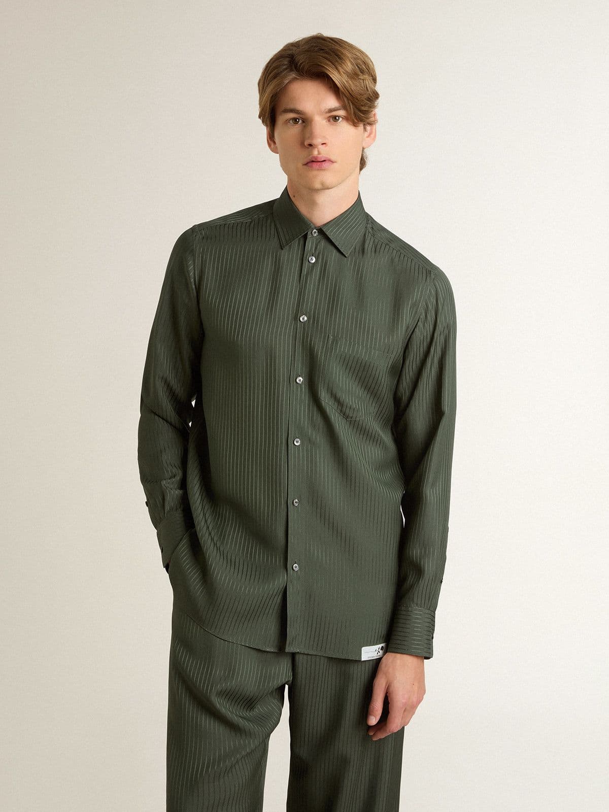 Men's dark green shirt with vertical stripes