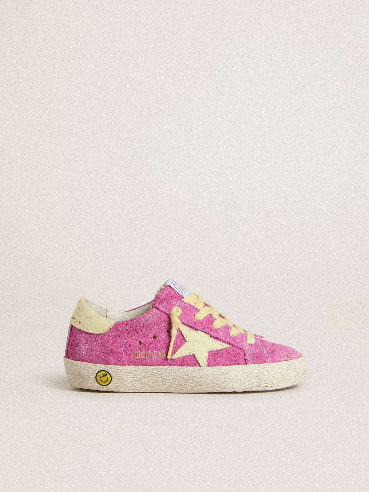Young Super-Star in pink suede with light yellow star and heel tab