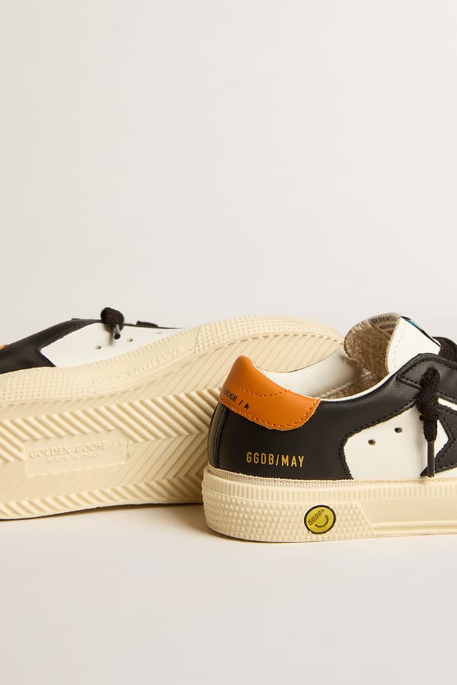 May Teen in black and white leather with black star and orange heel tab