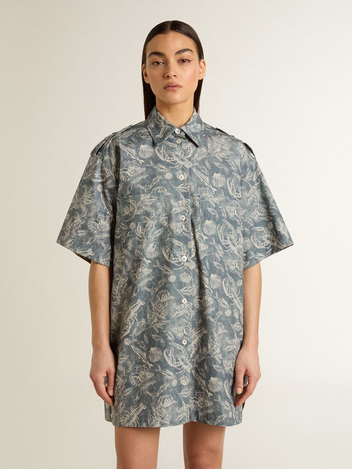 Women's short shirt dress in light blue cotton poplin with all-over marine print
