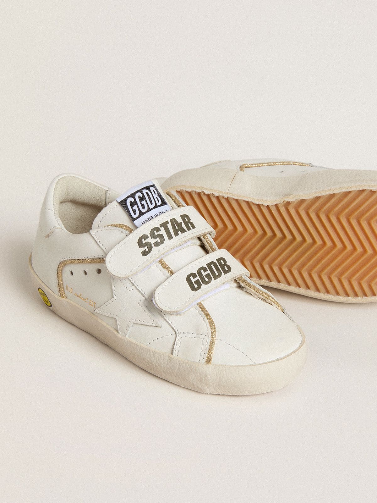 Young Old School in white leather with gold details