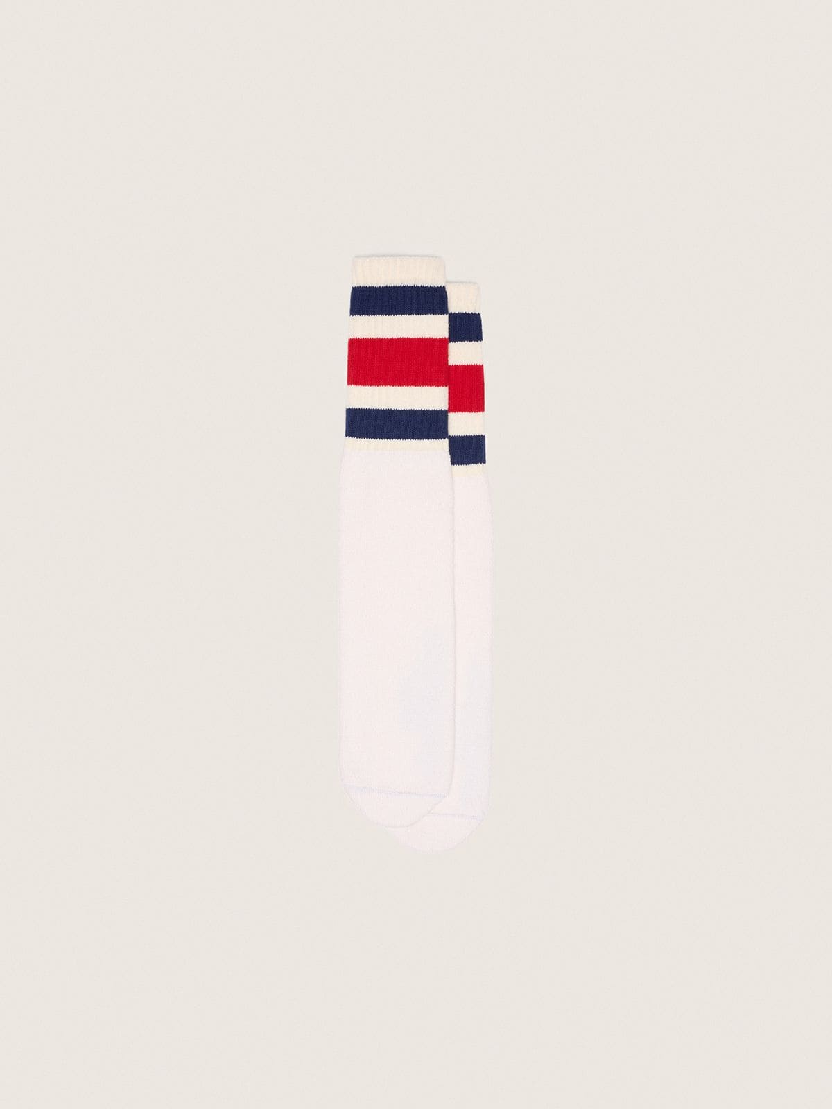 Worn-white socks with blue and red stripes