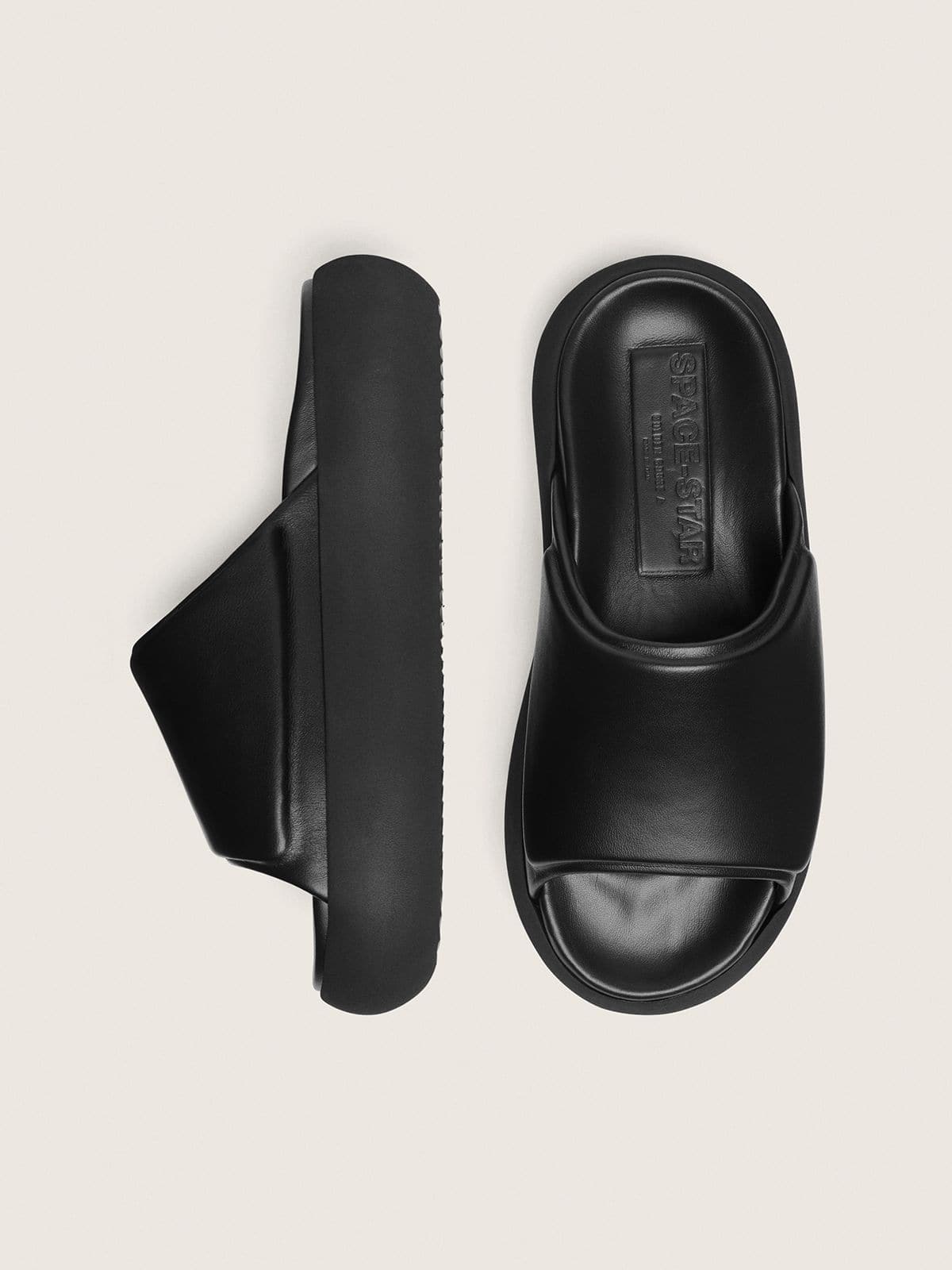 Women's Space-Star Slide slip-ons in black leather