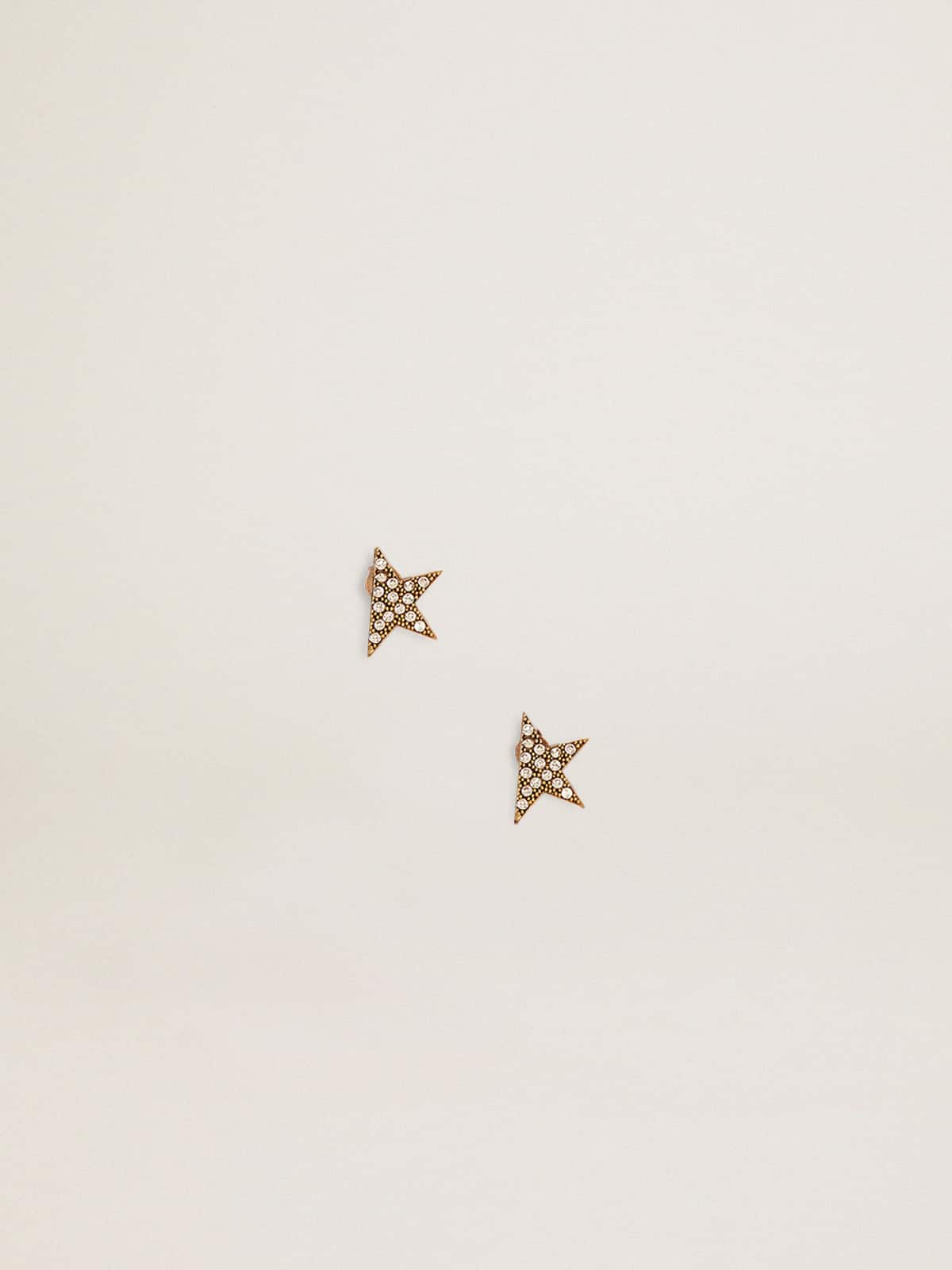 Women's stud earrings in antique gold color with crystals