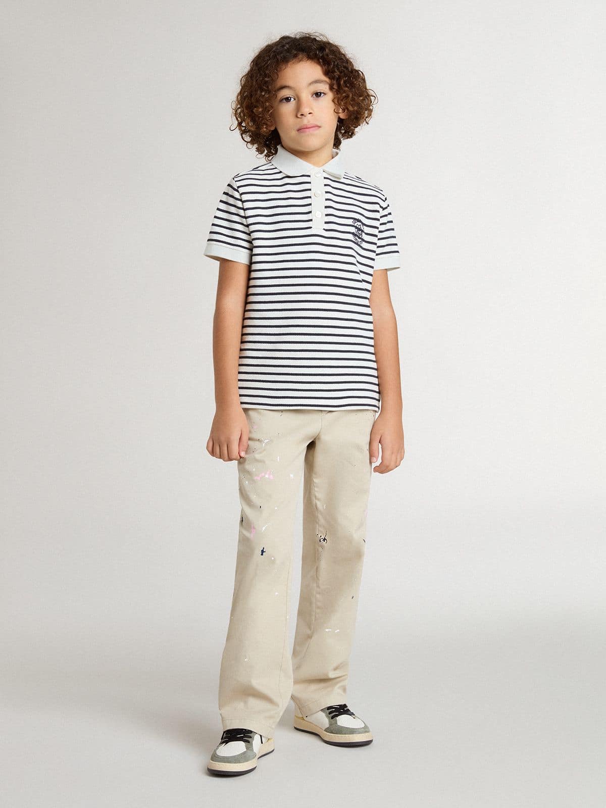 Boys' white cotton polo with navy blue stripes and embroidery