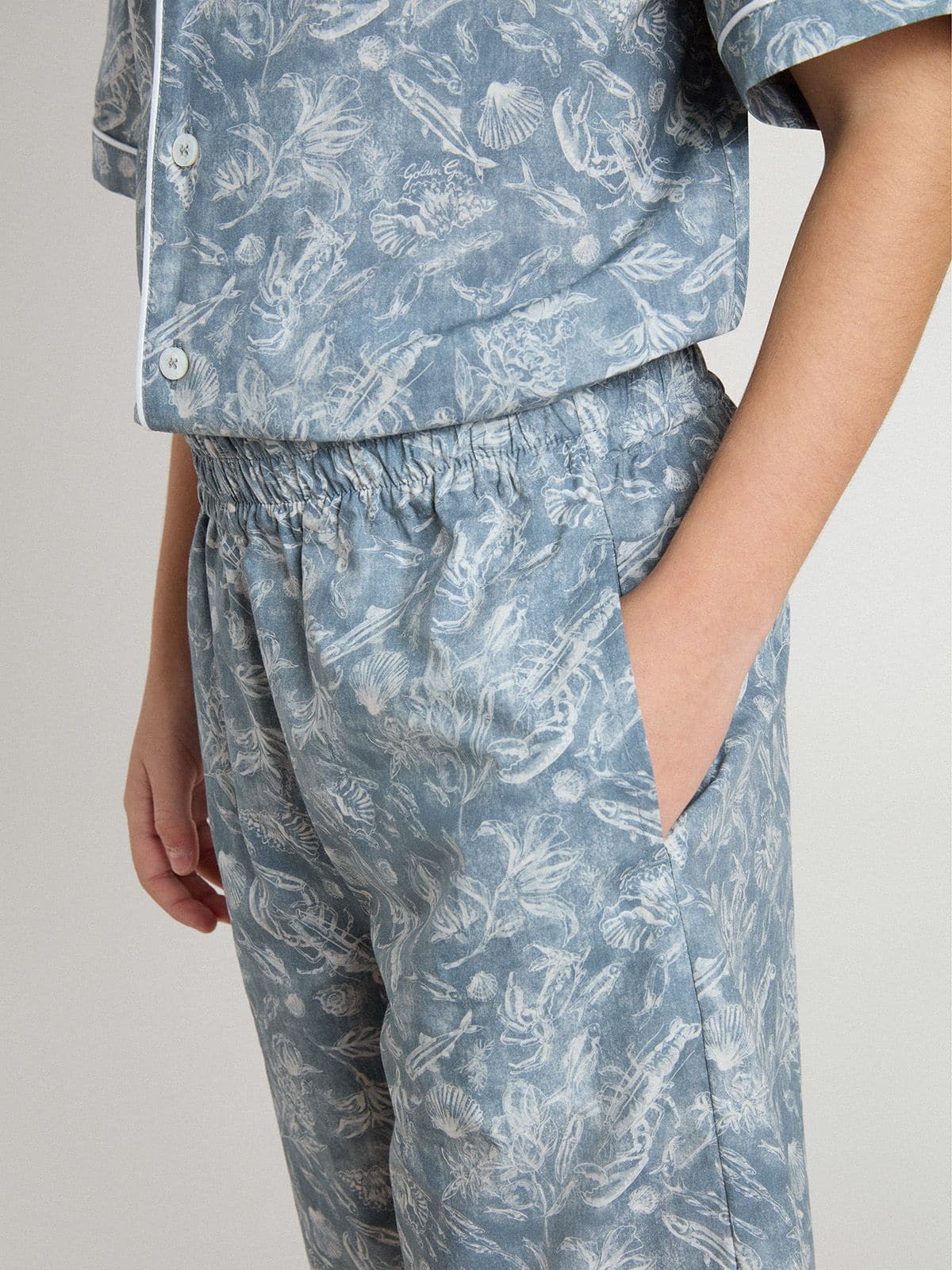 Boys’ blue shorts with white print