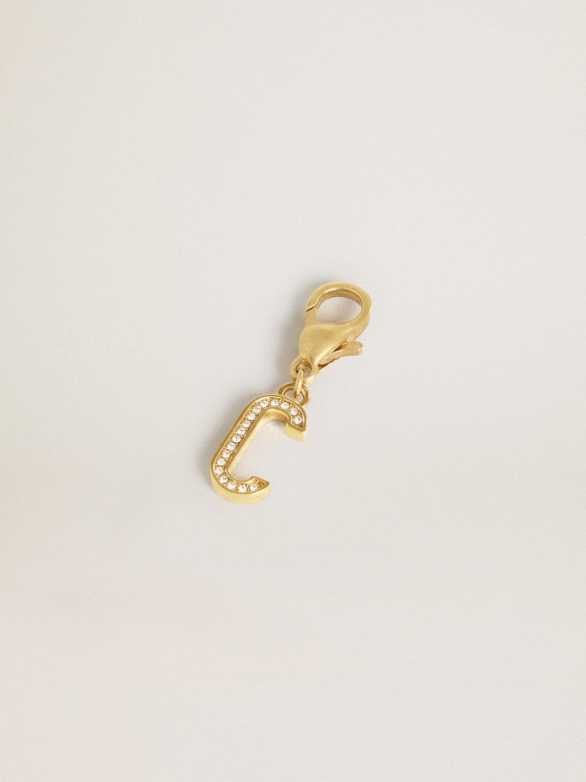 Letter C charm in gold-colored brass with crystals