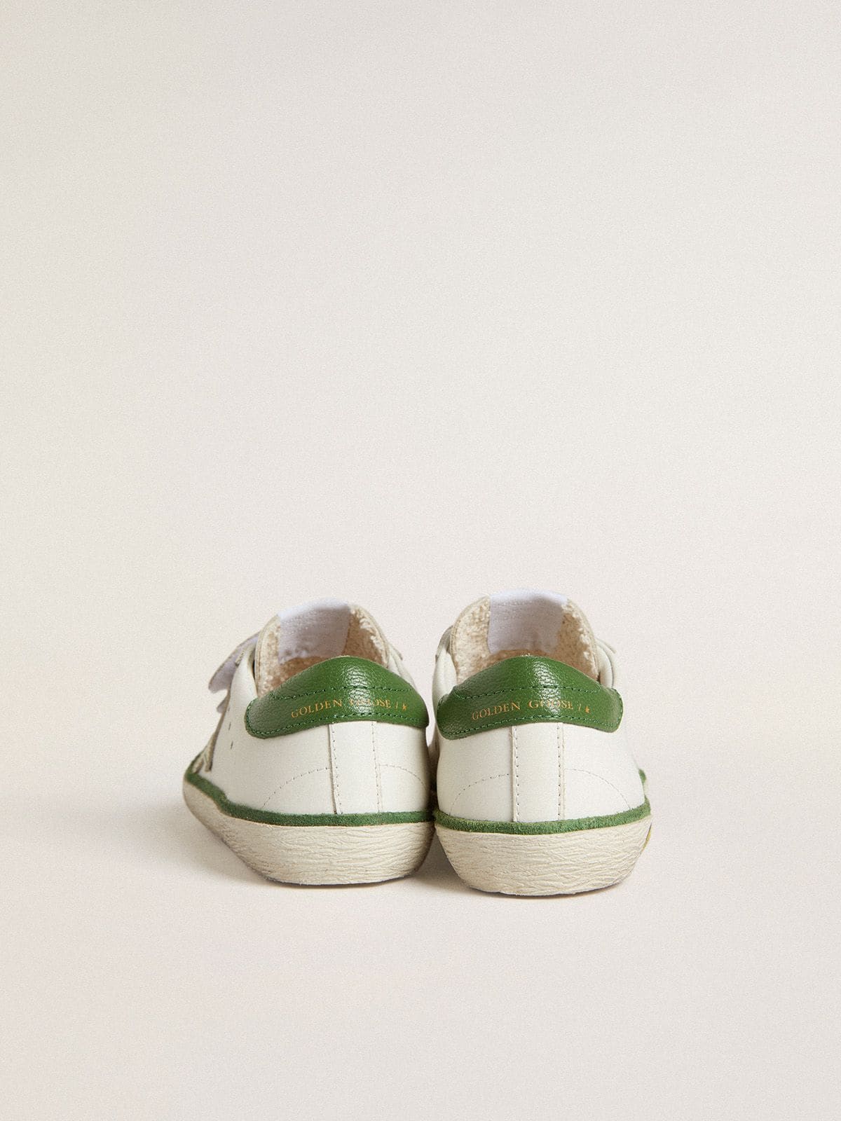 Young Old School in white leather with green nappa heel tab and green insert