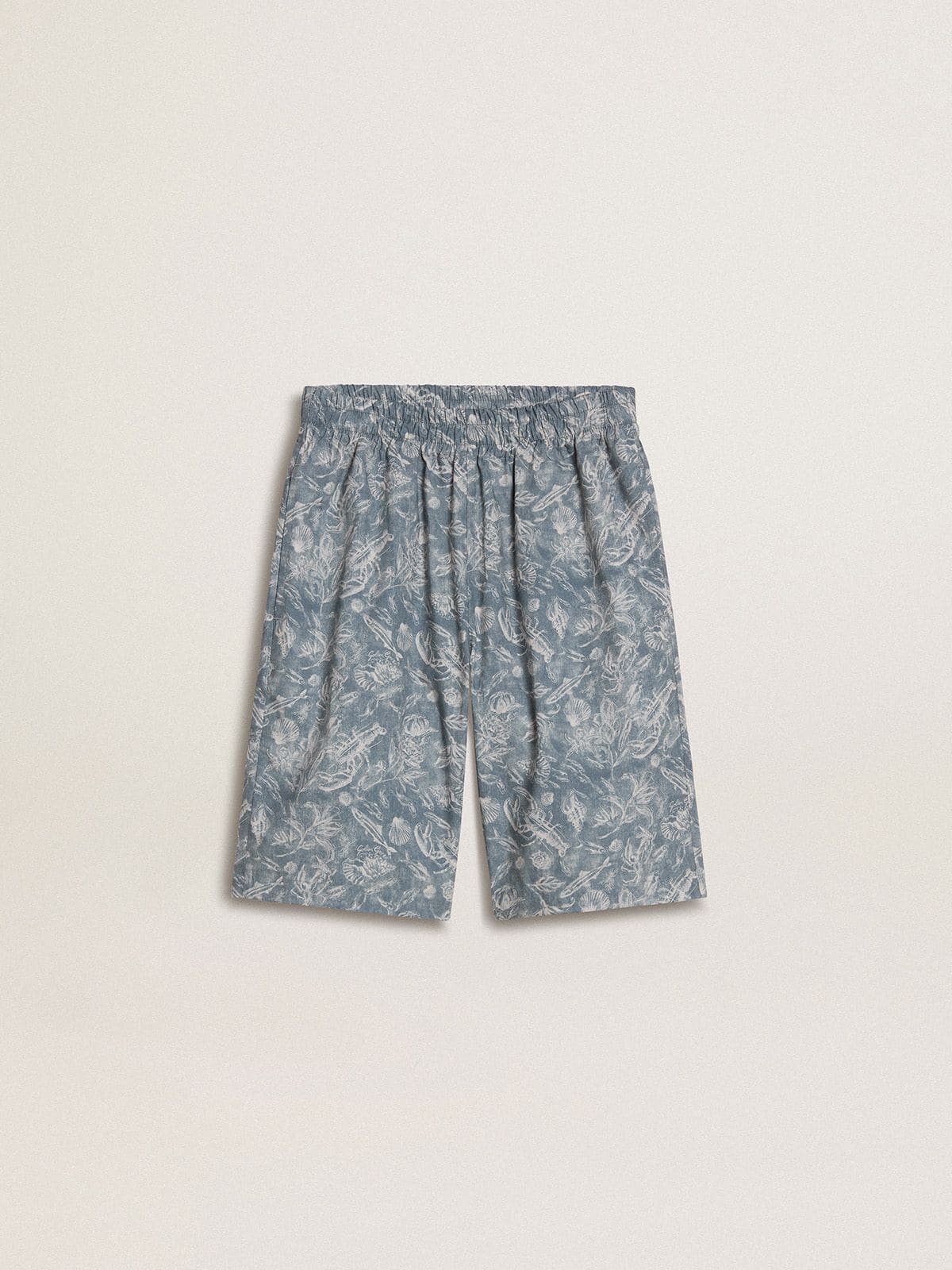 Boys’ blue shorts with white print