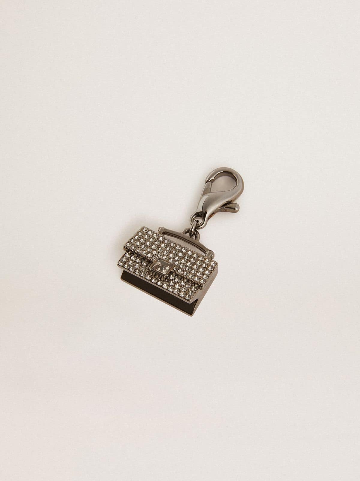 Purse-shaped charm in silver-colored brass with crystals