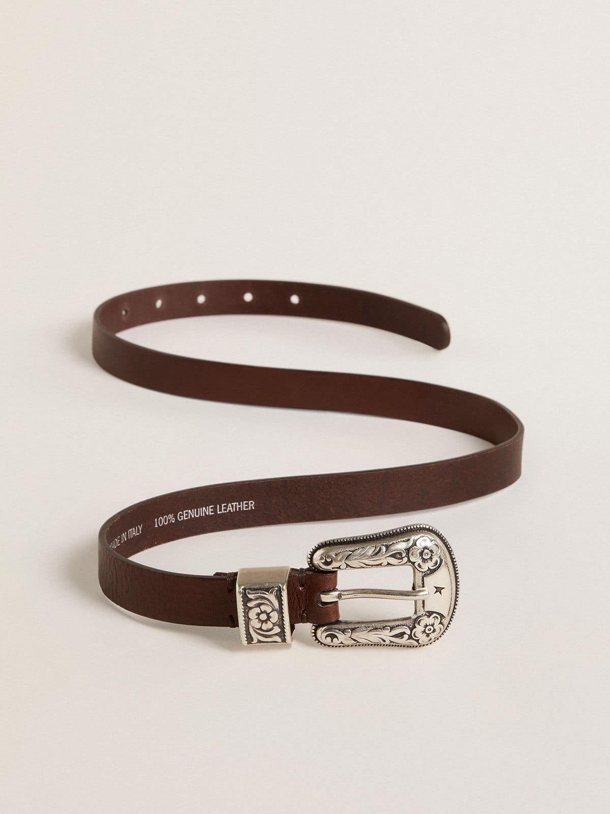 Women's dark brown leather belt with decorated silver buckle