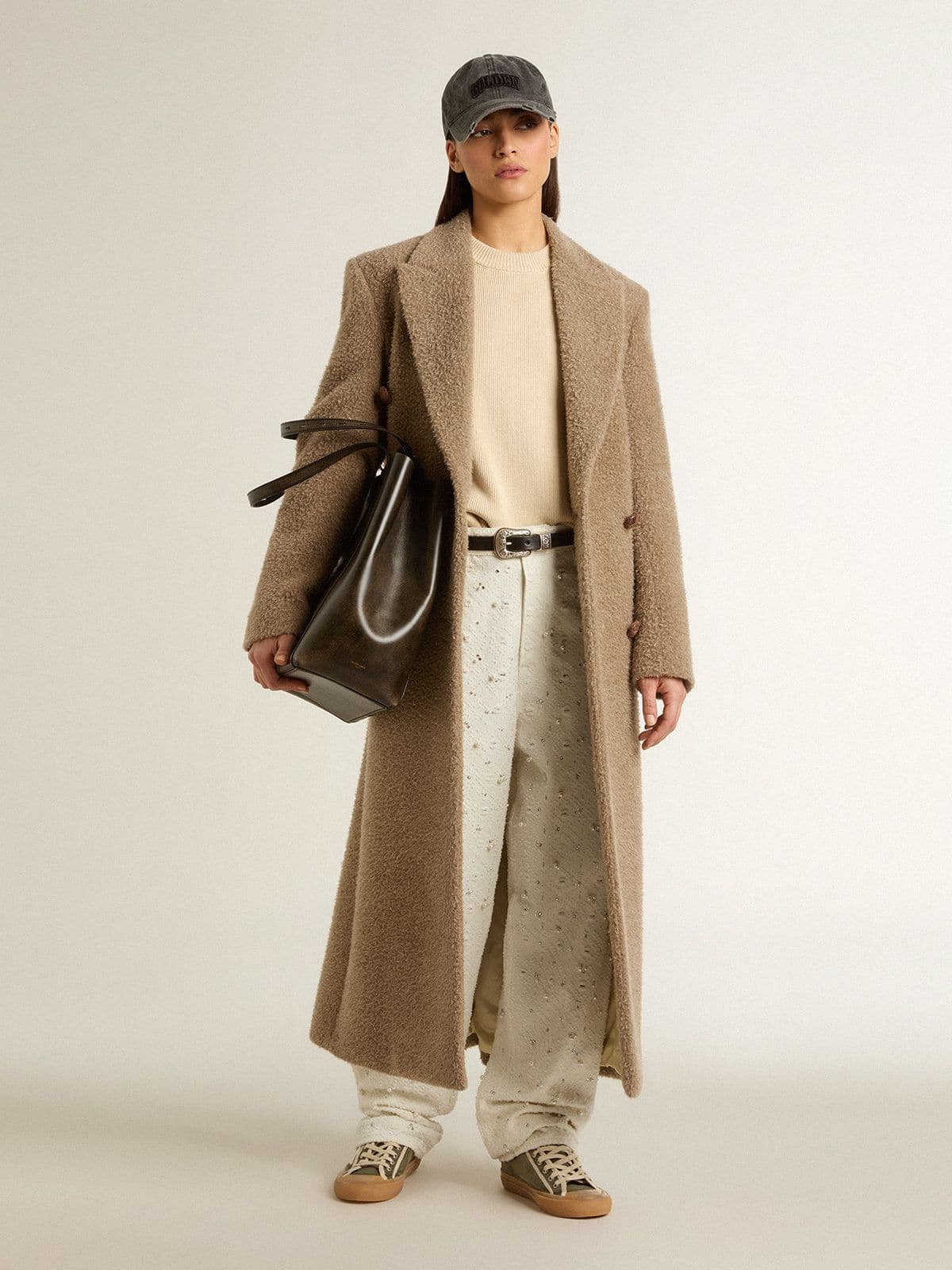 Women's white denim pants with beading and crystals