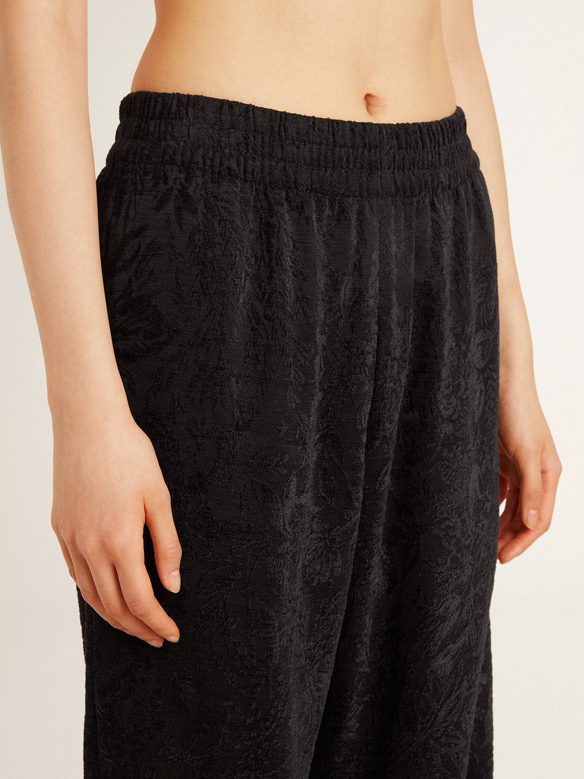 Women's black joggers with a tone-on-tone toile de jouy print