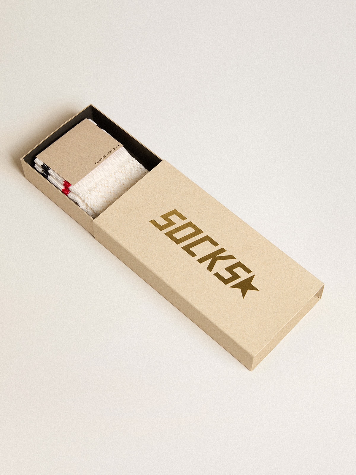 Long ribbed socks in vintage white with two-tone stripes