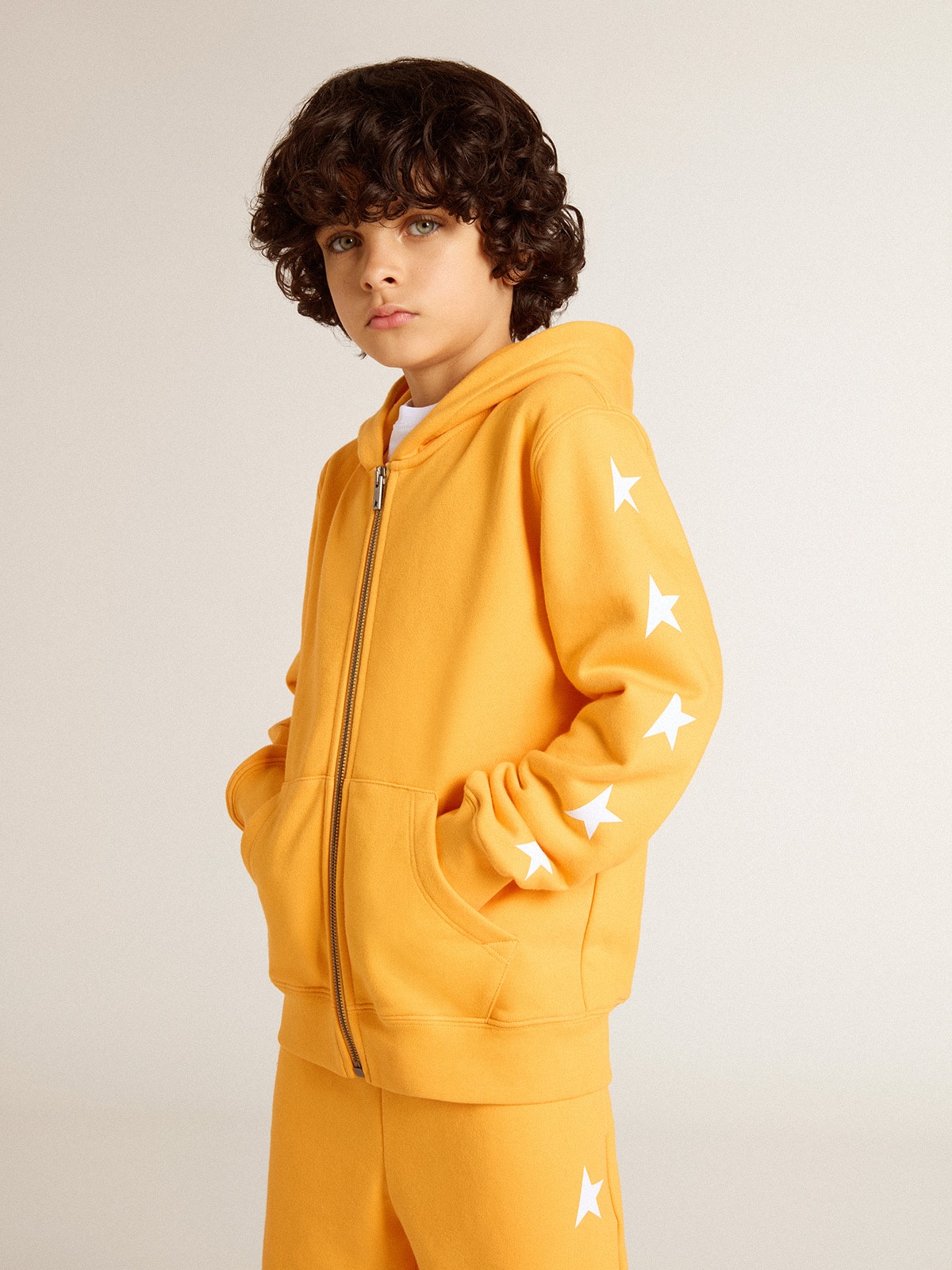 Boys’ orange sweatshirt with zip fastening