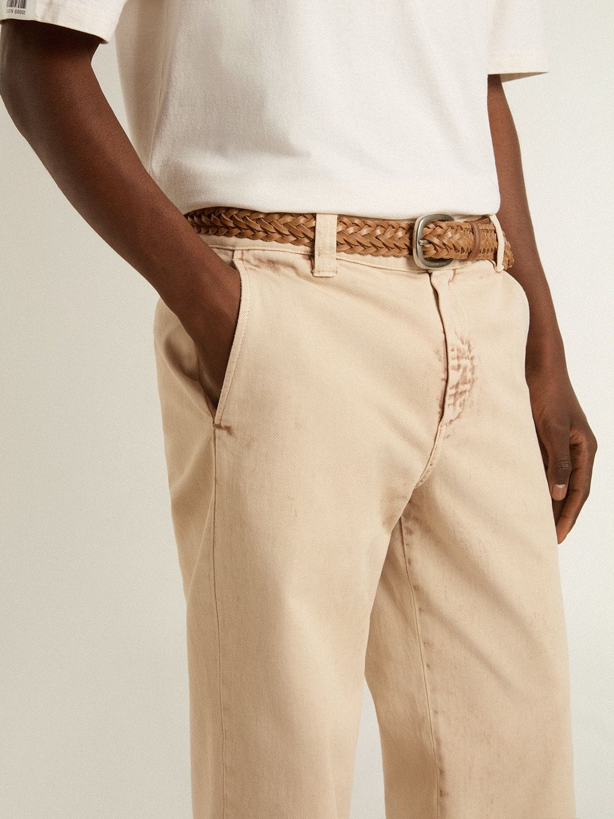Men's beige chinos with a lived-in look finish