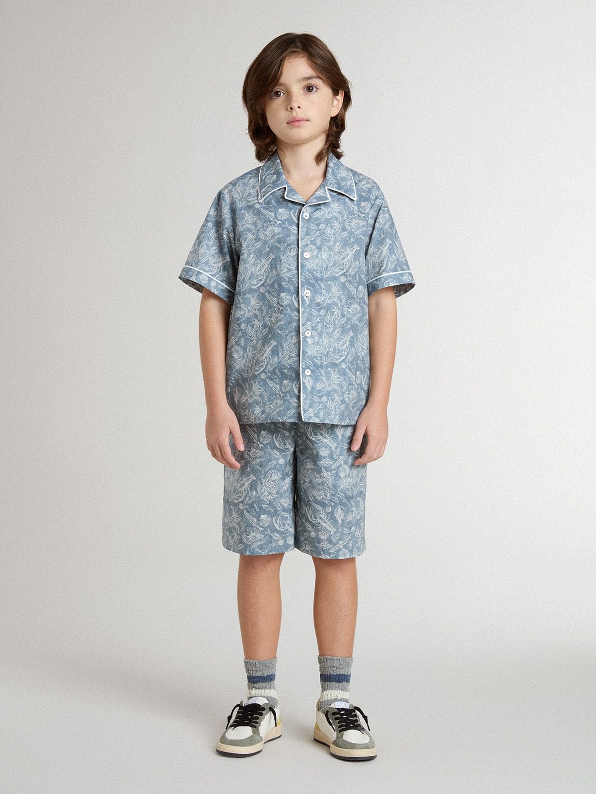 Boys’ blue shorts with white print