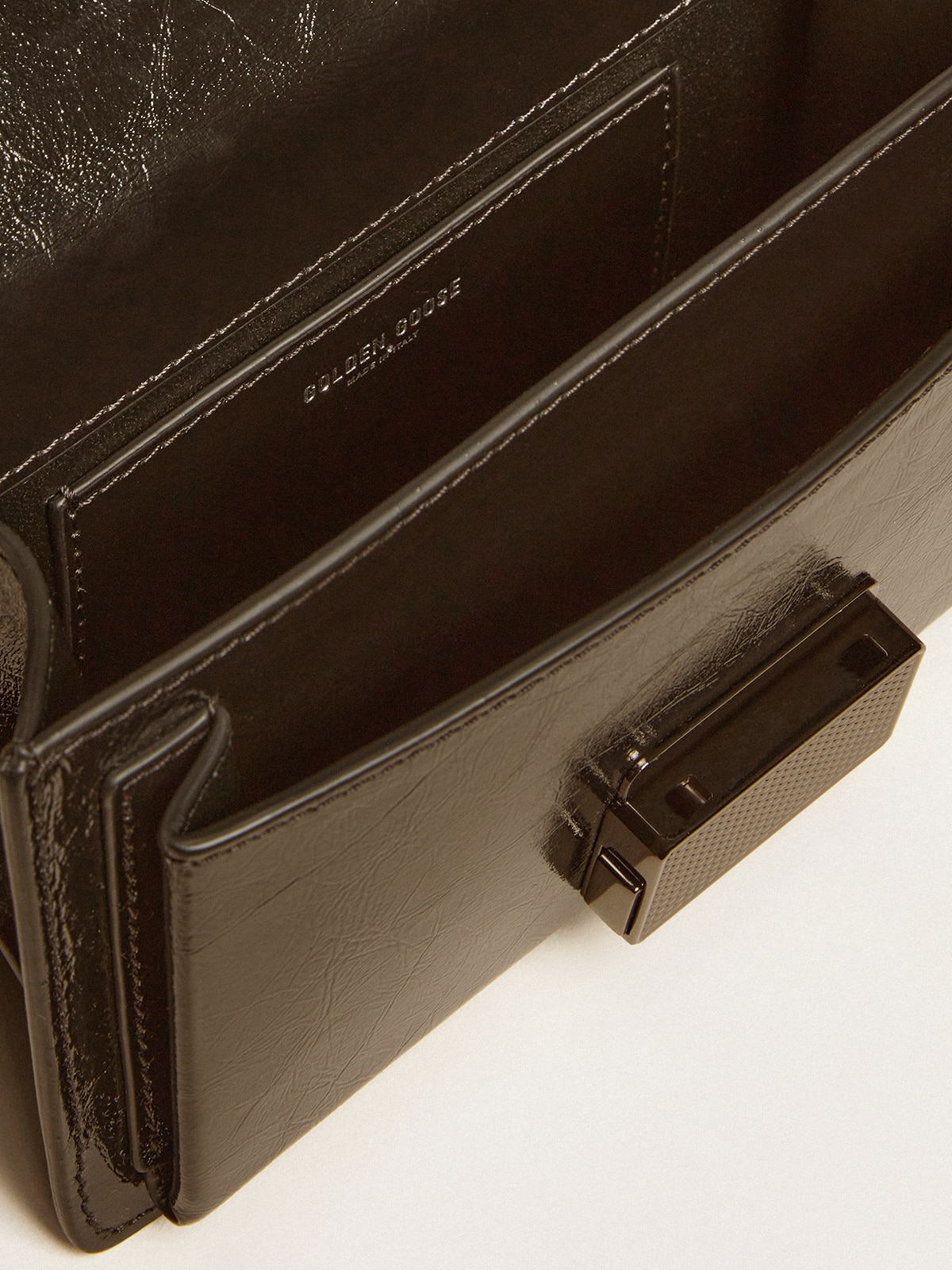 Small Venezia Bag in black metallic leather with black details