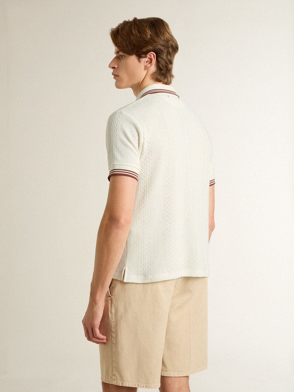 Men's polo shirt in white perforated knit with burgundy striped details