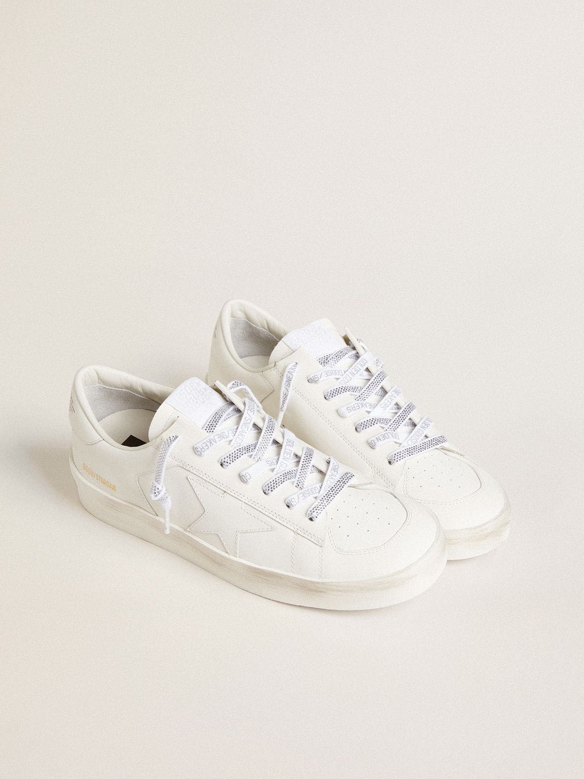 Swarovski laces with contrasting gray logo