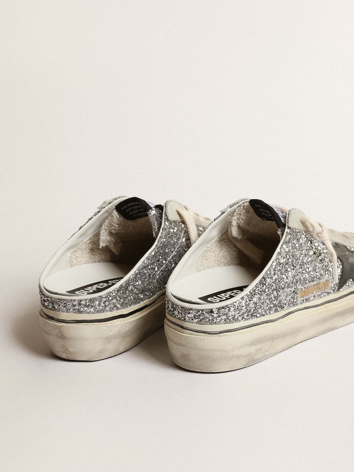 Women's Super-Star Sabot in silver glitter with black leather star